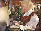 Marilyn Propst stays busy answering letters to Santa