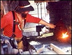 Roger Dillard showing his blacksmithing skills