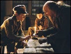 Barney Clark as Oliver and Ben Kingsley as Fagin in 'Oliver Twist'