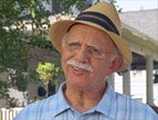 The Love Boat Captain, Gavin MacLeod, as Jonathan Sperry, an elderly man with a moustache and a straw hat