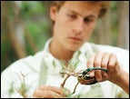 daily Devotion picture of young man pruning a branch