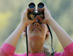 new year woman looking through binoculars