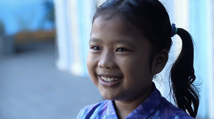 Nine-year-old orphan, Channa, smiles as she recounts the joy she feels knowing God as her Father.