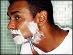 guy shaving his face