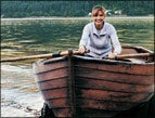 daily Devotion woman in boat with oars