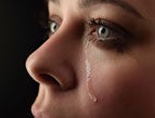 woman crying a tear